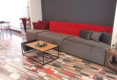 a living room with a couch and a coffee table at Boutique Apartment in Plovdiv
