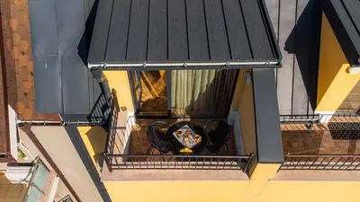 an overhead view of a balcony of a building at Pumpkin Spiced Suite with Own Parking and Office Setup in Sofia
