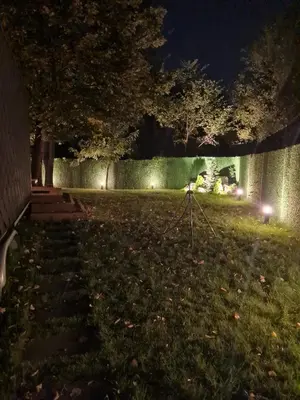 a camera on a tripod in a yard at night at Sofia Town House, FREE PARKING in Sofia