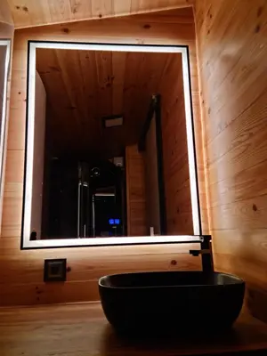 a bathroom with a large mirror and a black bowl at Sofia Town House, FREE PARKING in Sofia