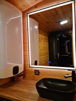 a bathroom with a black sink and a mirror at Sofia Town House, FREE PARKING in Sofia