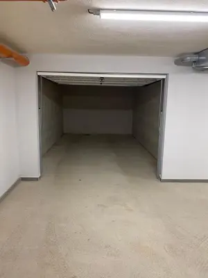 an empty garage with a door in a room at Madrid: A modern 2-bedroom apartment with parking in Sofia