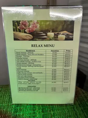 a sign for a menu of a restaurant at Nice apartment in Belvedere Club in Bansko