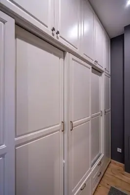 a white closet with two sliding doors in a room at Stylish Stay - 2BDR, 2BTHR+ Free Parking in Sofia