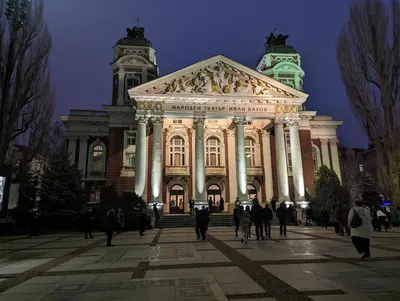 a large building with people walking in front of it at Lily's Studio 2 by Bulgarentals - Central Sofia in Sofia