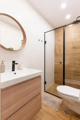 a bathroom with a shower and a sink and a toilet at Your Place in Sofia
