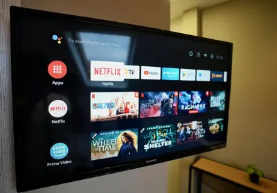 a flat screen tv with many movies on it at Lily's Studio 5 by Bulgarentals - Central Sofia in Sofia