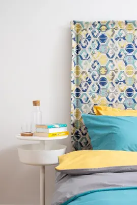 a bedroom with a bed and a side table at Bright and Stylish 2BD Flat in The City Centre by Flat Mаnager in Sofia
