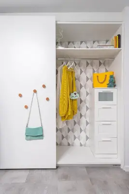 a room with a white closet with yellow towels at Bright and Stylish 2BD Flat in The City Centre by Flat Mаnager in Sofia