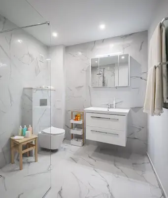 a white bathroom with a sink and a toilet at Bright and Stylish 2BD Flat in The City Centre by Flat Mаnager in Sofia
