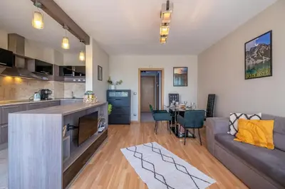 a kitchen and a living room with a couch at Deja vu, Cozy & Quiet 1 BDR Apt Fast Wi-Fi in Sofia