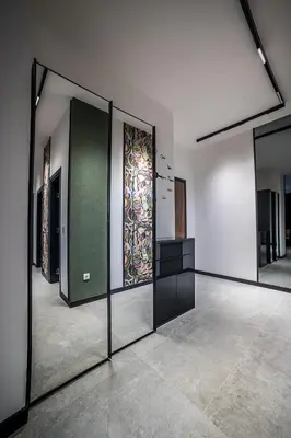 a group of mirrors in a room with a wall at ARHEYA 1 apart Архея 1 апартамент за гости in Karlovo