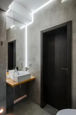 a bathroom with a sink and a mirror at Designer 1BD Cinématique on Solunska by Flat Mаnager in Sofia