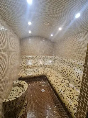 a large room with a large tub in a bathroom at Aspen Golf D 401 in Bansko