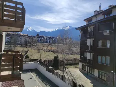 a view of mountains from the balcony of a building at Belvedere Holiday Club ,apartment A202 in Bansko