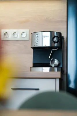 a coffee machine sitting on top of a counter at Modern Maisonette - 2 Bedrooms - Terrace - Vitosha View in Sofia