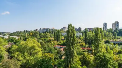 a view of a city with trees and buildings at Modern Maisonette - 2 Bedrooms - Terrace - Vitosha View in Sofia