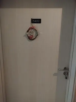 a door with a speed limit sign on it at Gondola lift apartment 5402 in Bansko