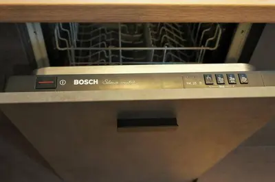 a close up of the top of a dishwasher at 