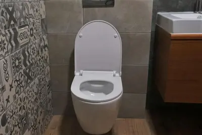a bathroom with a white toilet and a sink at 