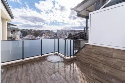 a balcony with a view of a city at Chic 1BR Apartment with Balcony in Plovdiv in Plovdiv