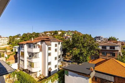 an aerial view of a city with buildings at Hills View Central Apartment in Plovdiv