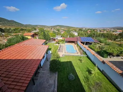 an aerial view of a house with a swimming pool at Vila Toplika in Kara Agach