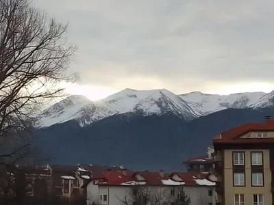 a view of a mountain range with snow covered mountains at Sapphire Mountain 1 in Bansko