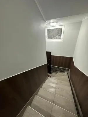 an empty room with a window on the wall at VELI HOUSE VELINGRAD/ ВелиХаус Къща за гости Велинград in Velingrad