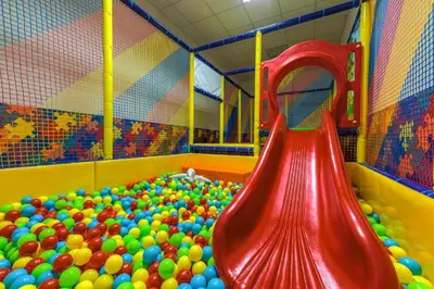 a large pile of balls in a ball pit at N.Joy Holiday Apartment 532 by Oak Residence in Smolyan