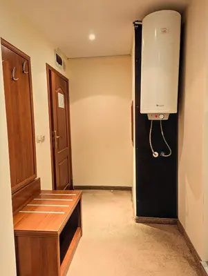 a room with a water heater and a door at Great View Apartment near Gondola in Bansko
