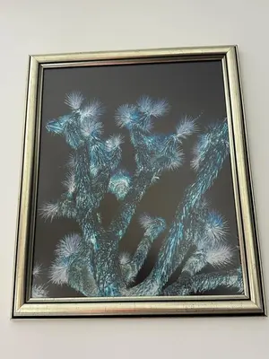 a painting of a pine tree in a gold frame at Бутик хотел ресторант брасери и релакс зона Сажитариус in Kyustendil