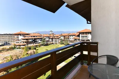 a balcony with a view of a resort at Cedar Lodge III One BDRM Flat B2 in Bansko