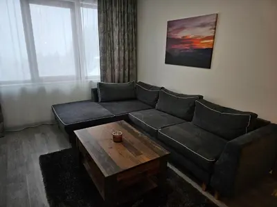 a living room with a couch and a coffee table at VIVA 4-A-16 ski to the door Grand Monastery in Pamporovo