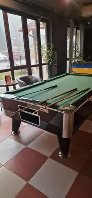 a snooker table in a room with a pool table at Apartment B45 Borovets Gardans in Borovets
