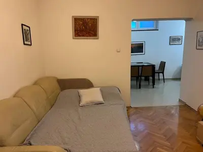 a living room with a couch and a table at Casa del Rey in Sofia