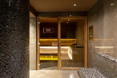 a entrance to a building with a glass door at Мия 2 Deluxe Royal Spa in Velingrad