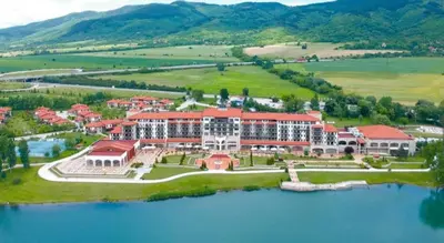 an aerial view of a resort on a lake at Pravets spa resort apartments in Pravets