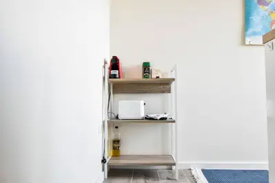 a shelf in the door of a room at Skyline View - Very Central - Metro - Washer&Dryer in Sofia