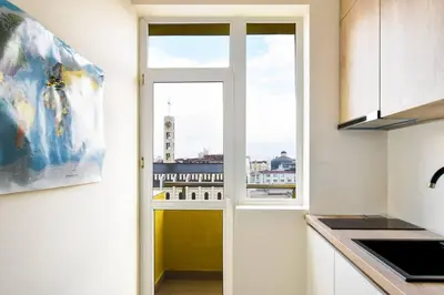 an open kitchen door with a view of the city at Skyline View - Very Central - Metro - Washer&Dryer in Sofia