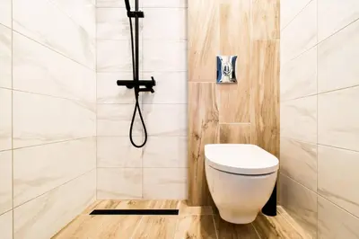 a bathroom with a toilet and a shower at Skyline View - Very Central - Metro - Washer&Dryer in Sofia