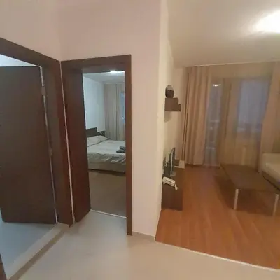 a room with a door leading to a bedroom at Апартамент Belvedere G106 in Bansko