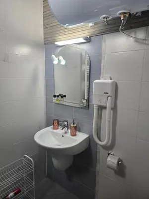 a bathroom with a sink and a mirror at Belvedere K203 in Bansko