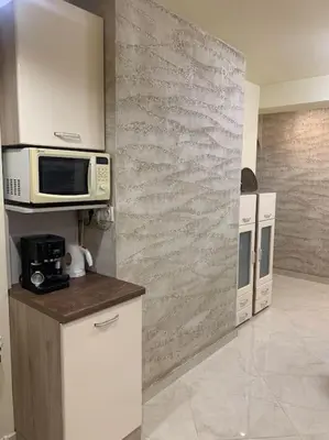 a kitchen with a microwave and a counter top at Lena in Sofia