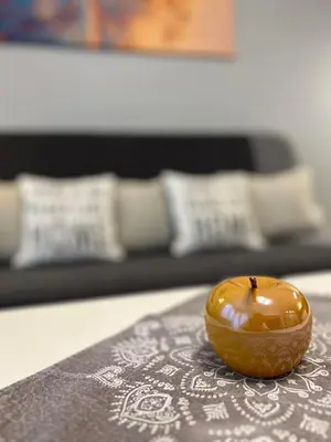 a caramel apple sitting on top of a table at Boston Cozy Elegant Family Apt w Parking Near NSA in Sofia