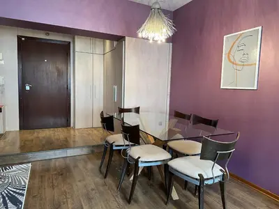 a dining room with a table and chairs at Rakovski Residence in Sofia