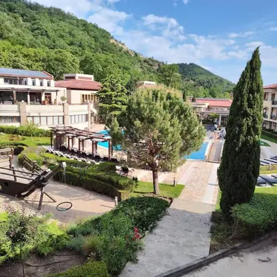 a view of a resort with a swimming pool at Modern 2BDRM in 5* Resort & pool in Sandanski