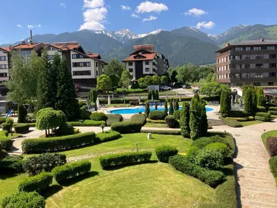 a view of a park with trees and bushes at PARADISE RELAX APARTMENT in Bansko