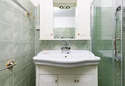 a bathroom with a sink and a shower at A Nostalgic Getaway in Plovdiv's Historic Quarter by Flat Mаnager in Plovdiv