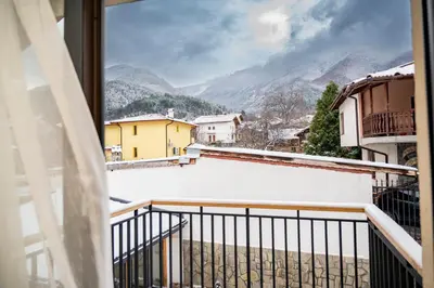 a balcony with a view of the mountains at Villa Doma in Sapareva Banya